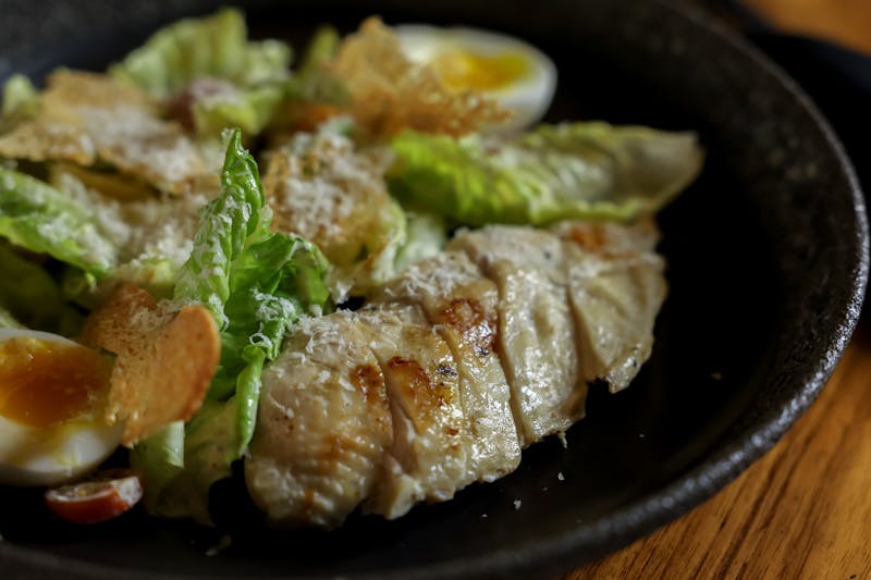 Grilled Chicken Caesar salad with romaine and parmesan